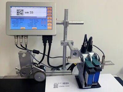 Impresora de inyección de tinta térmica D-EA con pantalla táctil de 7 pulgadas Sistema de bloqueo RFID sin contacto y fácil instalación para la impresión de números de lote